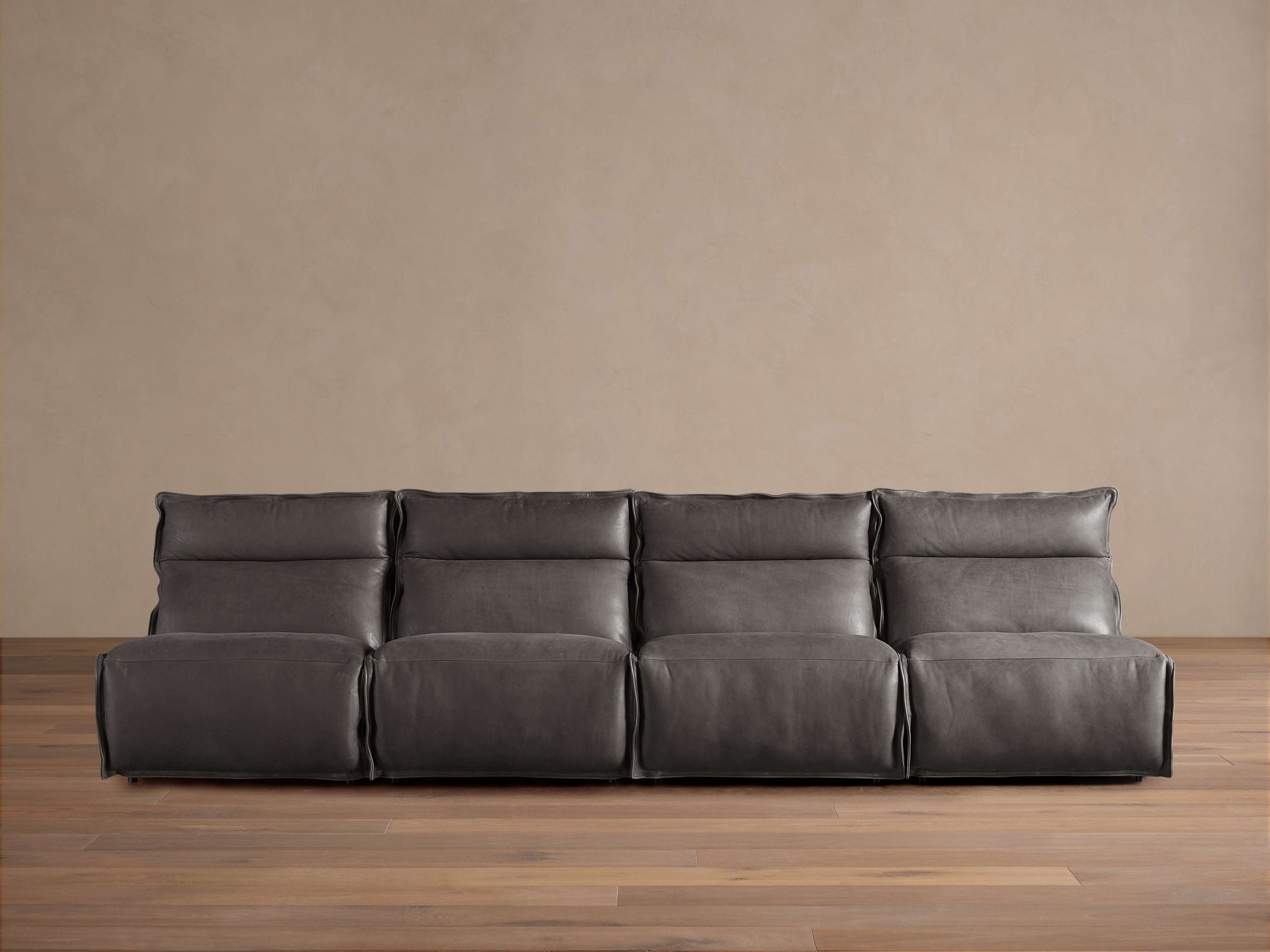 Rowland Leather Four-Piece Armless Motion Modular Sofa